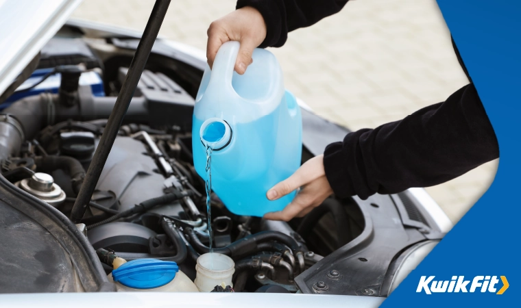 filling up windscreen washer fluid top up