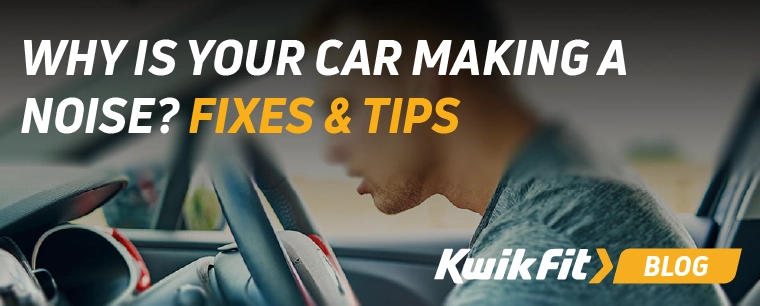 A person in the drivers seat leaning forward